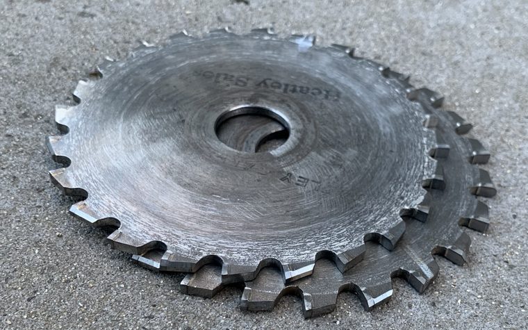 Sharpened TCT circular saw blade on the workshop floor in Bunbury